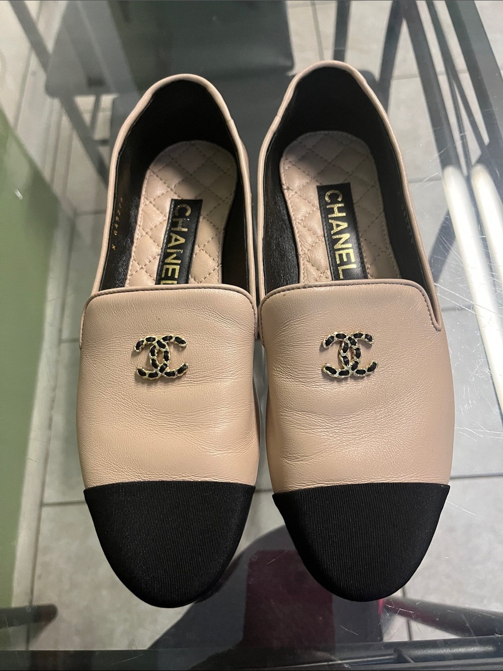 CHANEL Beige and Black Cap-Toe Leather Loafers with CC Logo